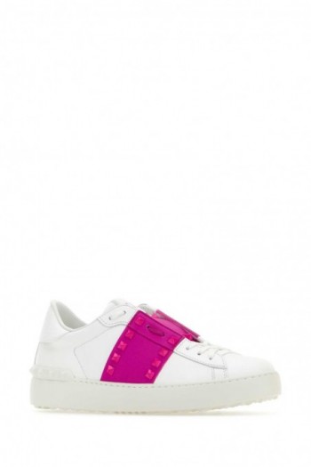 Valentino Białe skórzane sneakersy Rockstud Untitled z różowym paskiem